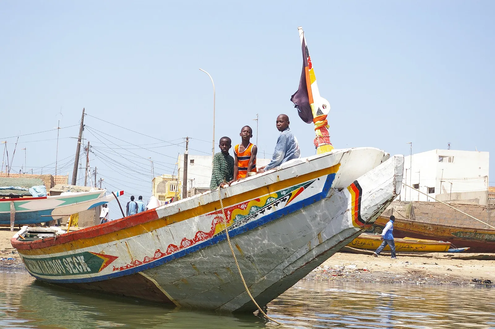 A large wooden fishing boat of the type used along the West African coast