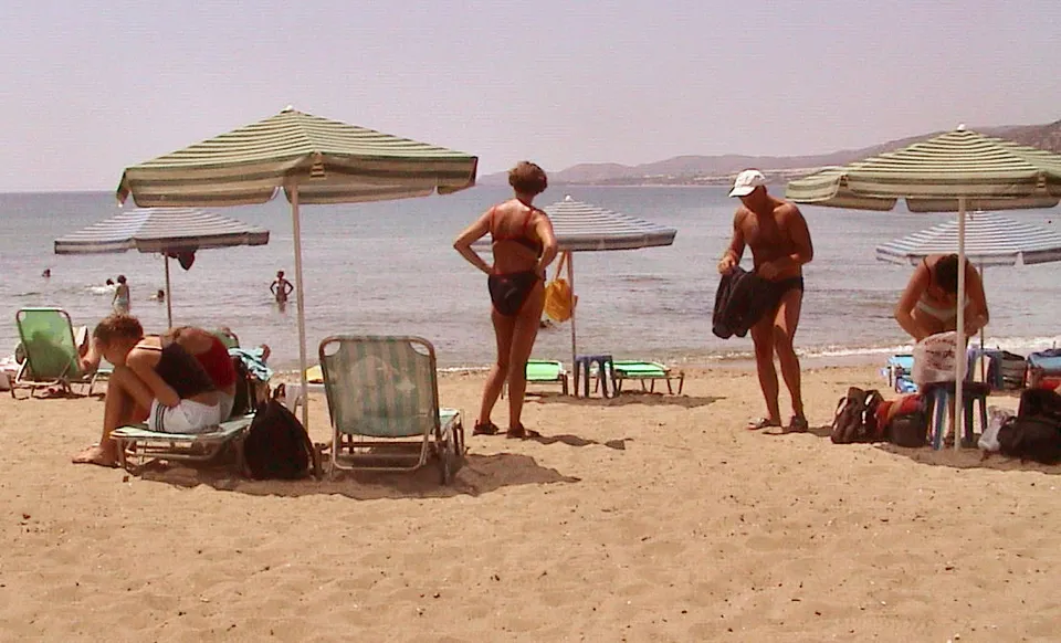 Beach parasols providing shade from the summer sun
