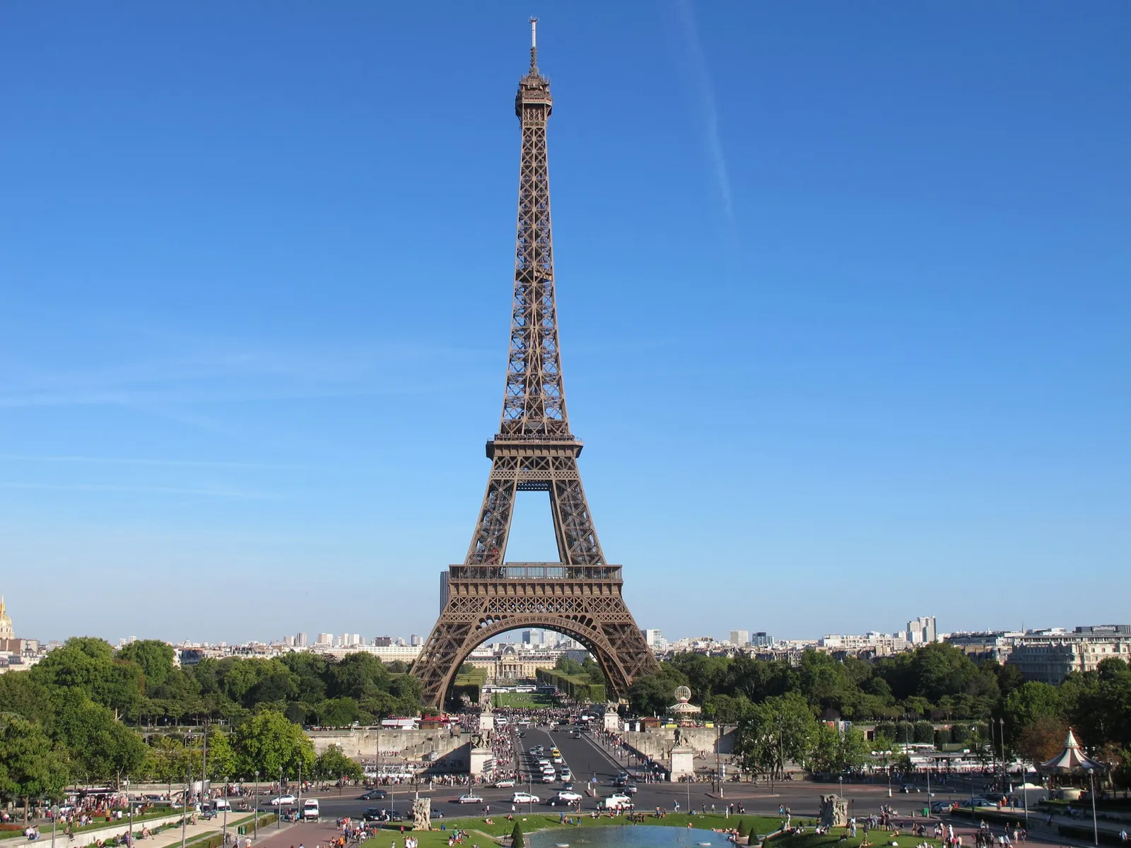 The Eiffel Tower in Paris under clear summer skies