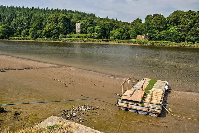 A tower folly on the Strancally estate seen from across the River Blackwater