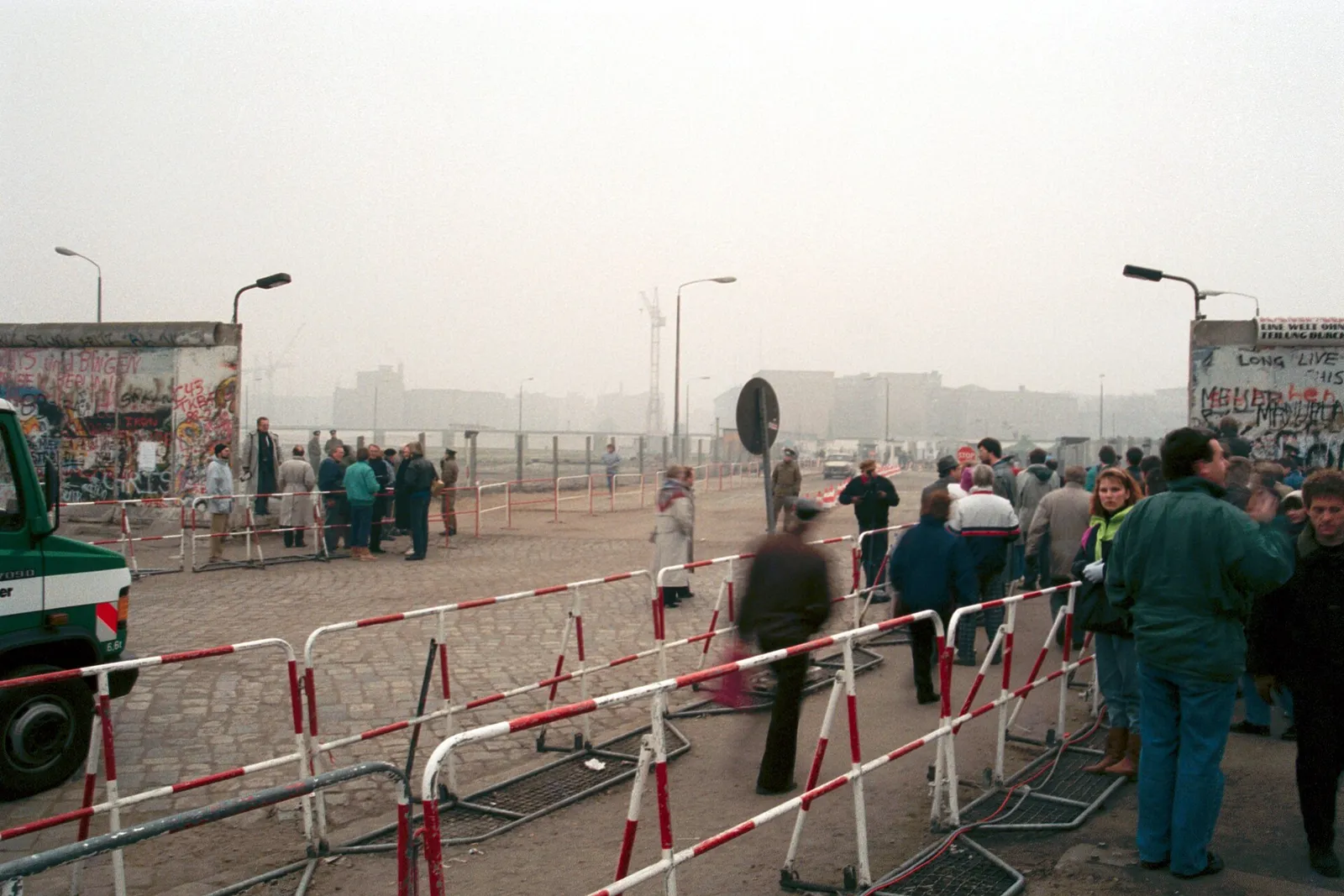 Crowds at a newly opened gap in the Berlin Wall at Potsdamer Platz, November 1989