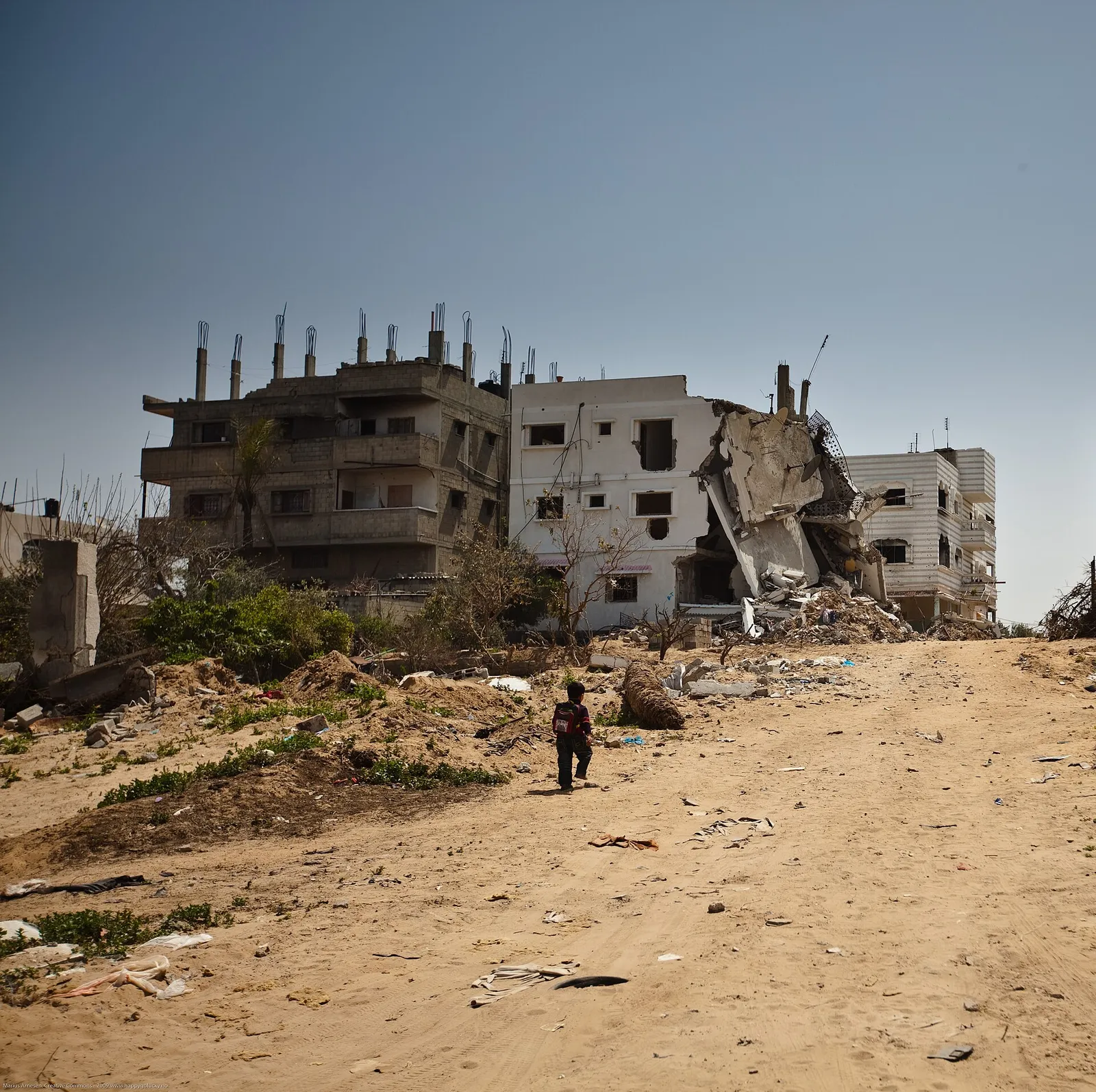 A street of damaged buildings in Gaza