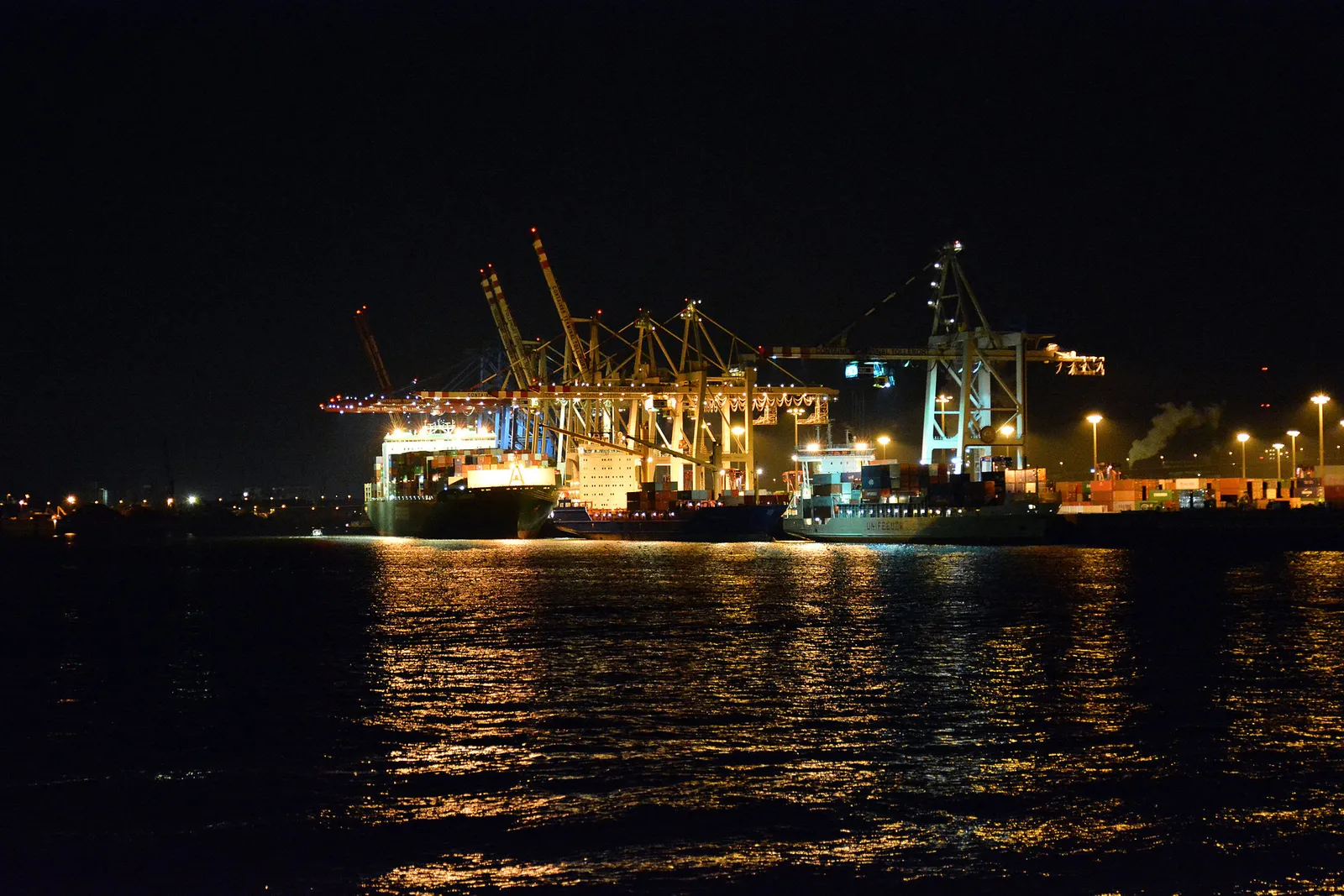 Cranes and stacked containers at a container terminal
