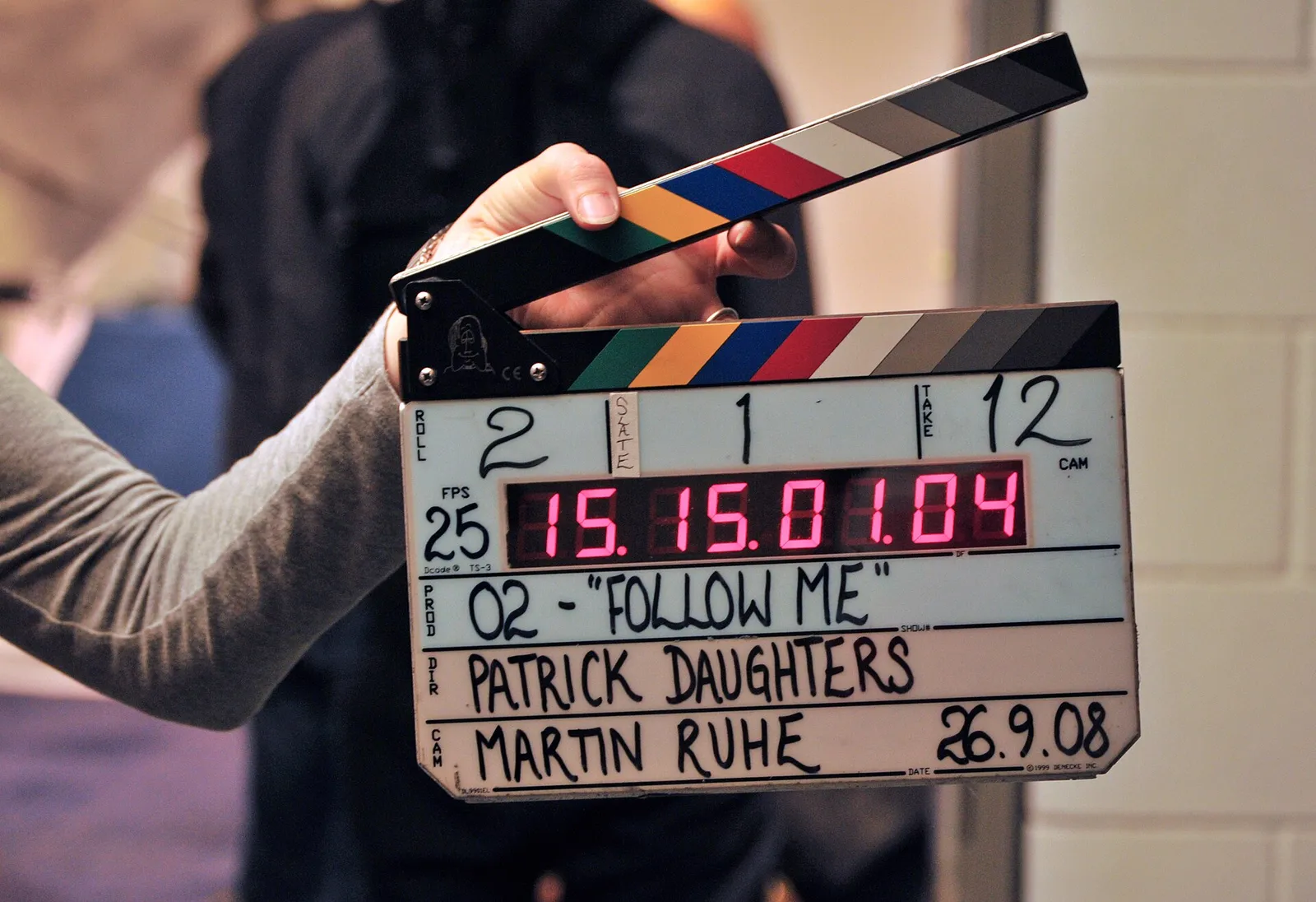 A film clapperboard on set