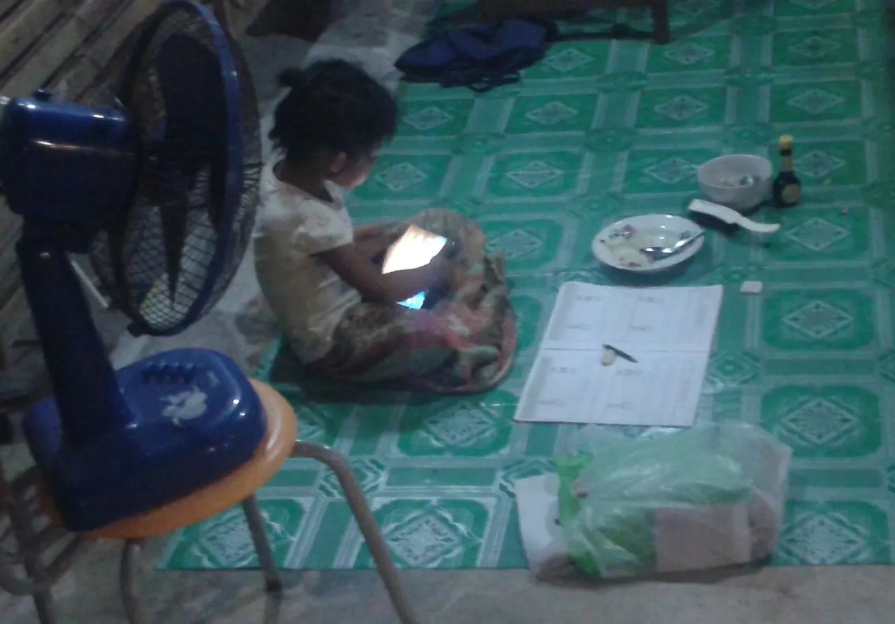 A young child using a tablet computer