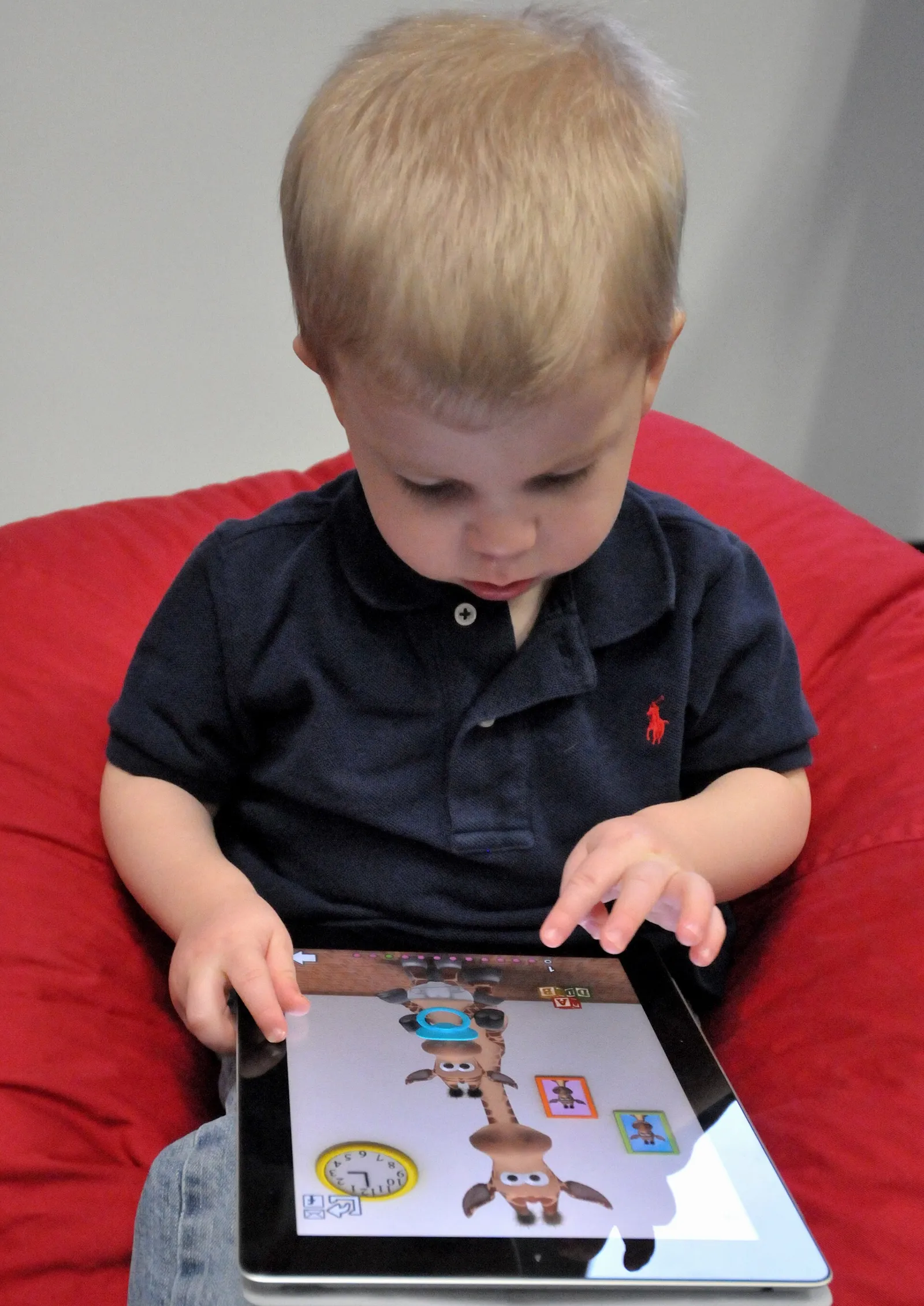 A young child using a tablet (file image)