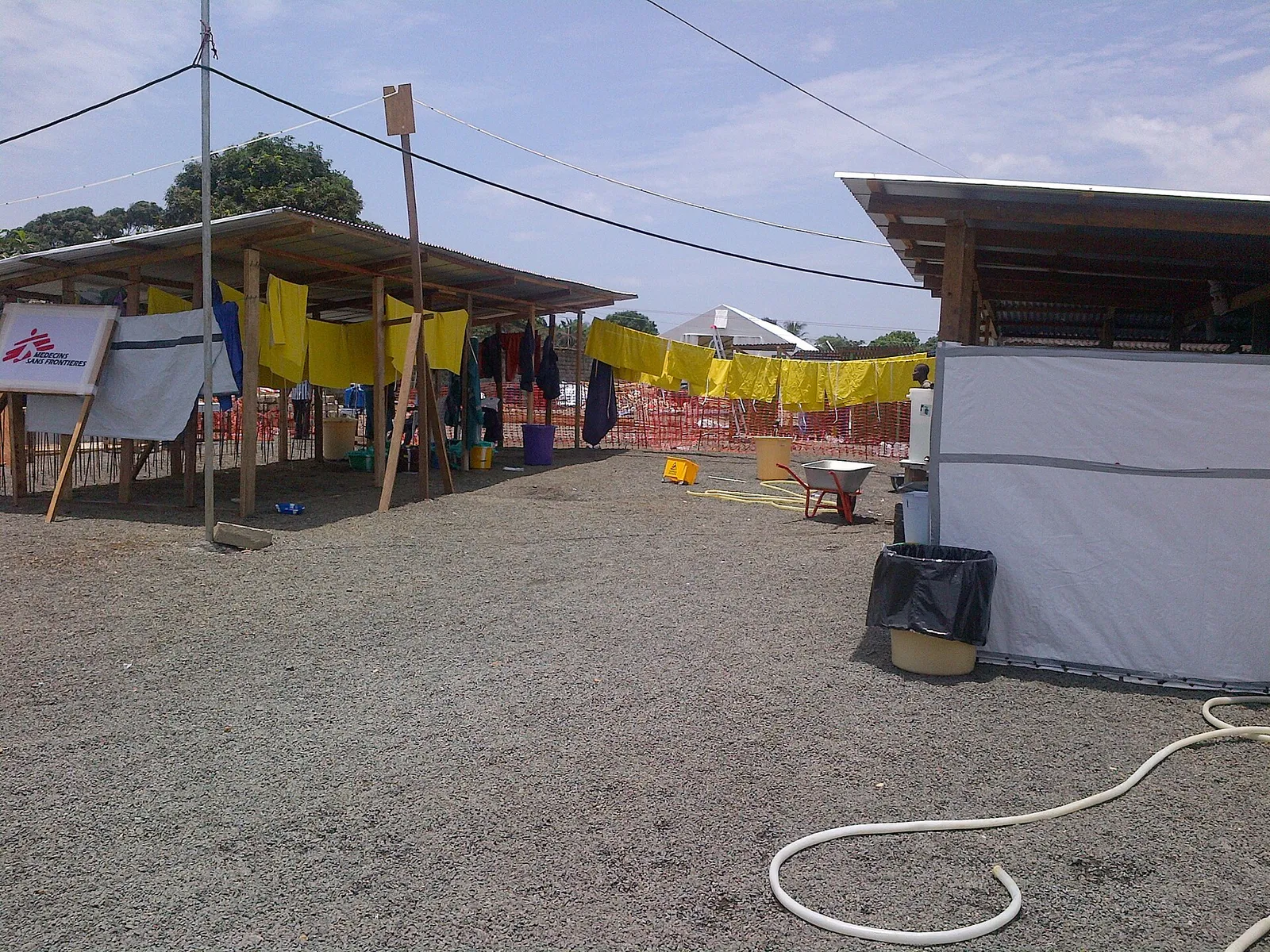 Health workers in protective equipment at an Ebola treatment unit