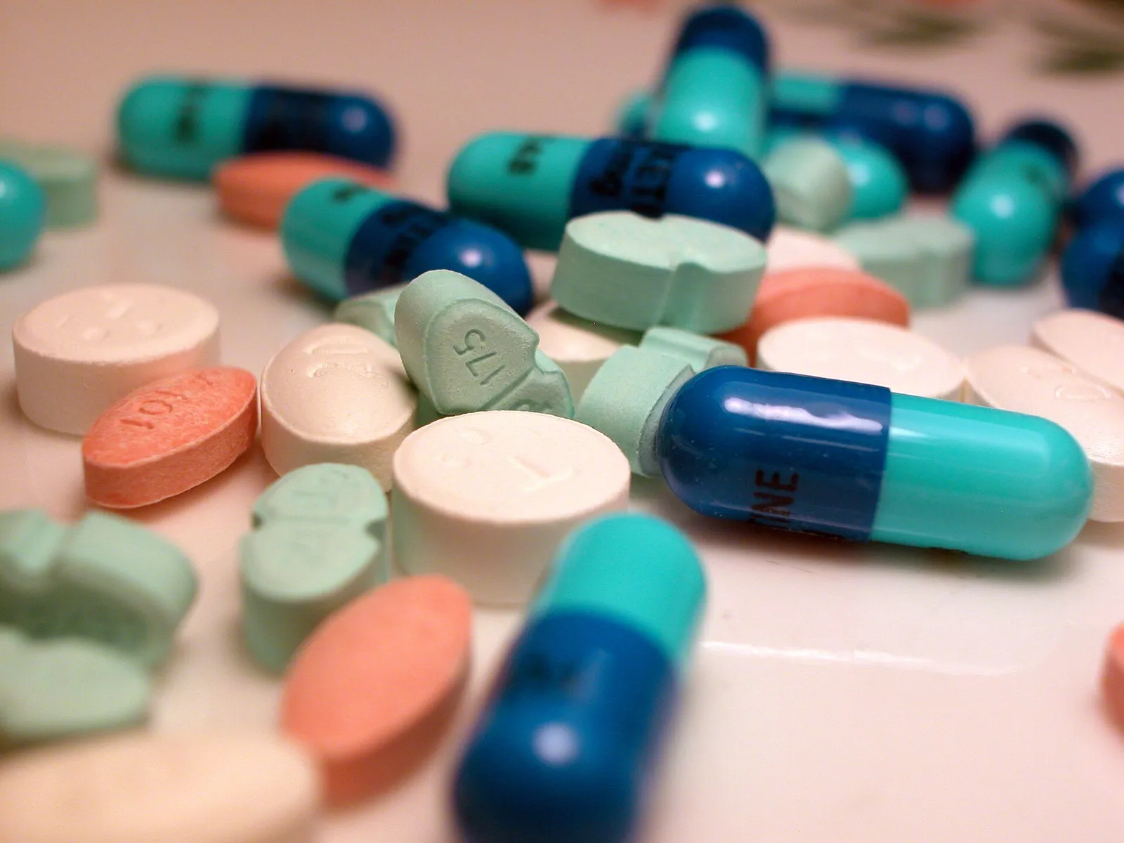 Assorted pills and tablets (illustrative)