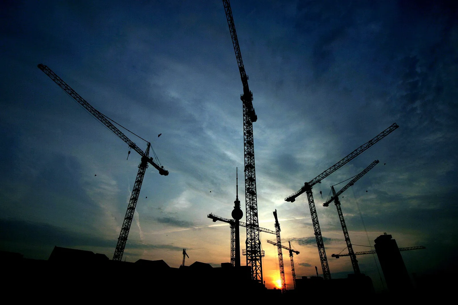 Construction cranes in central Berlin (file photograph)
