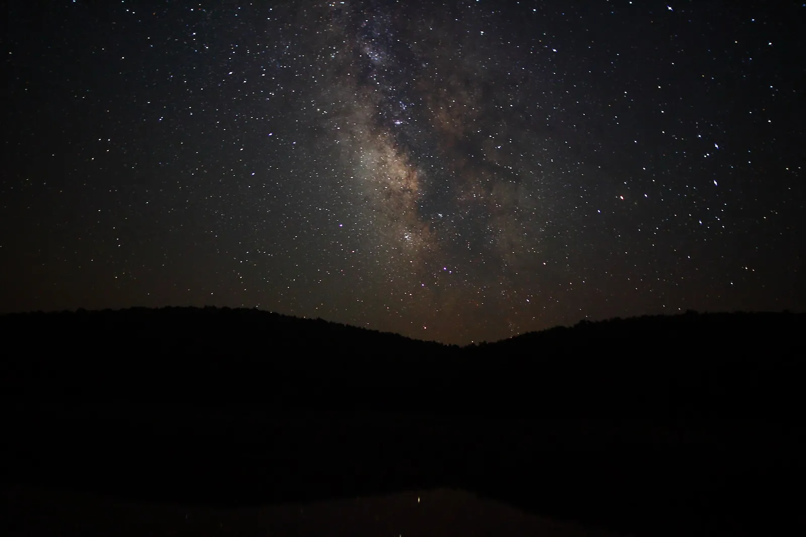 The Milky Way over hills on a clear night