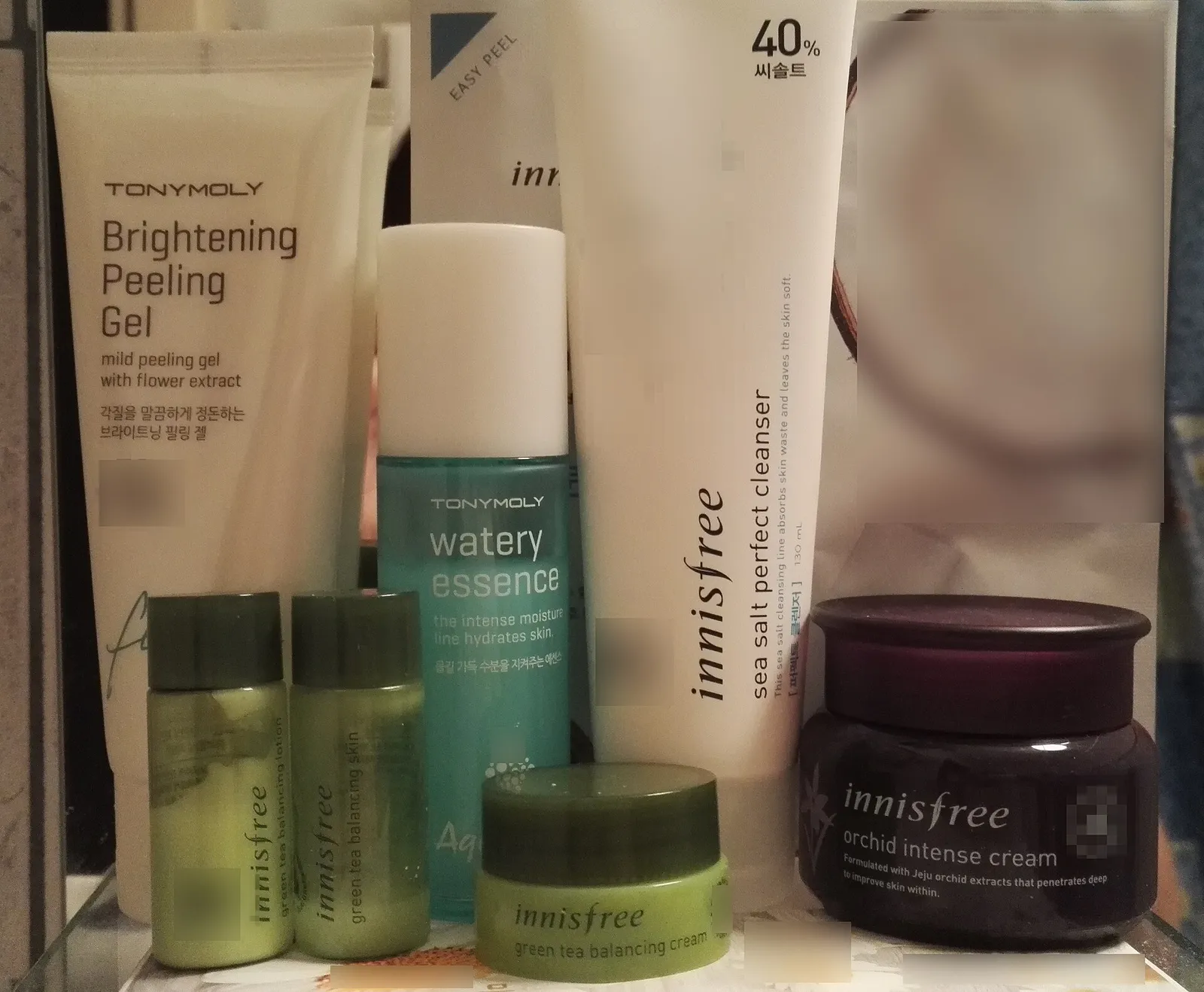 Korean skincare and cosmetics products arranged on a retail shelf