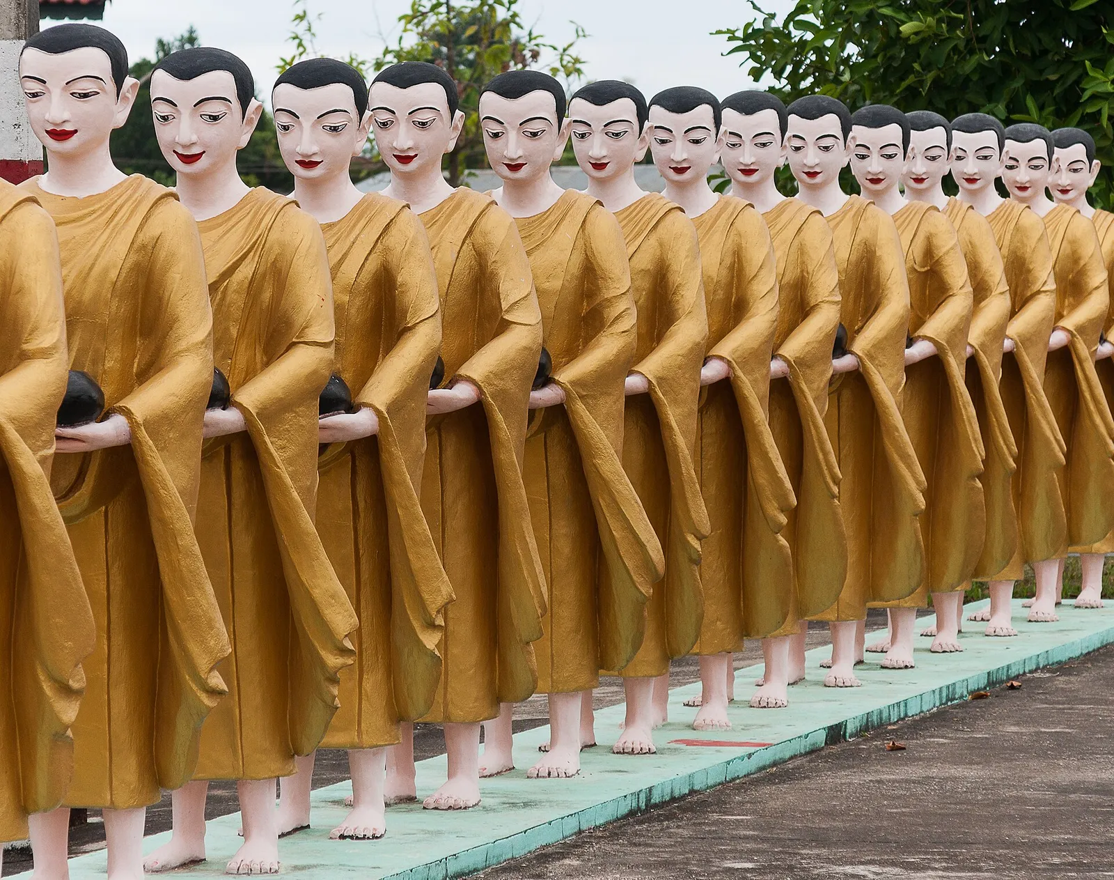Statues of monks at a Buddhist pagoda in Myanmar