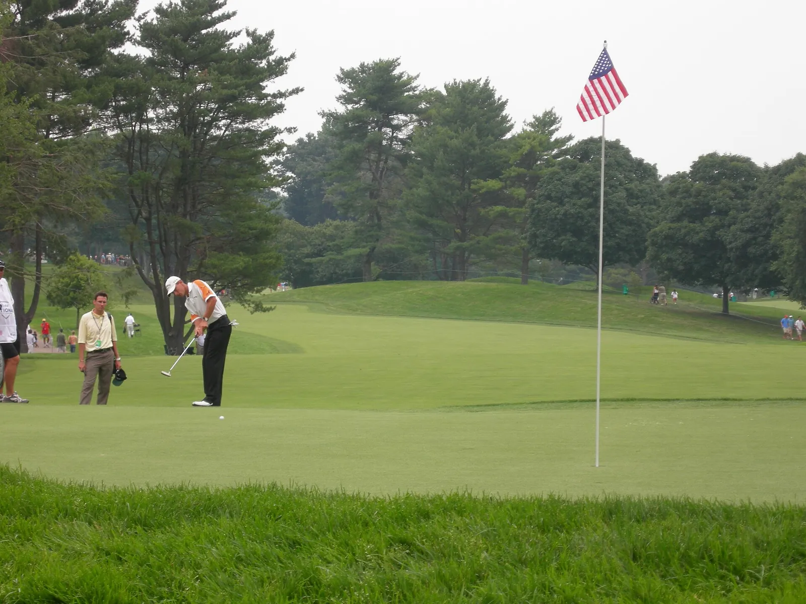 A professional golf tournament in progress