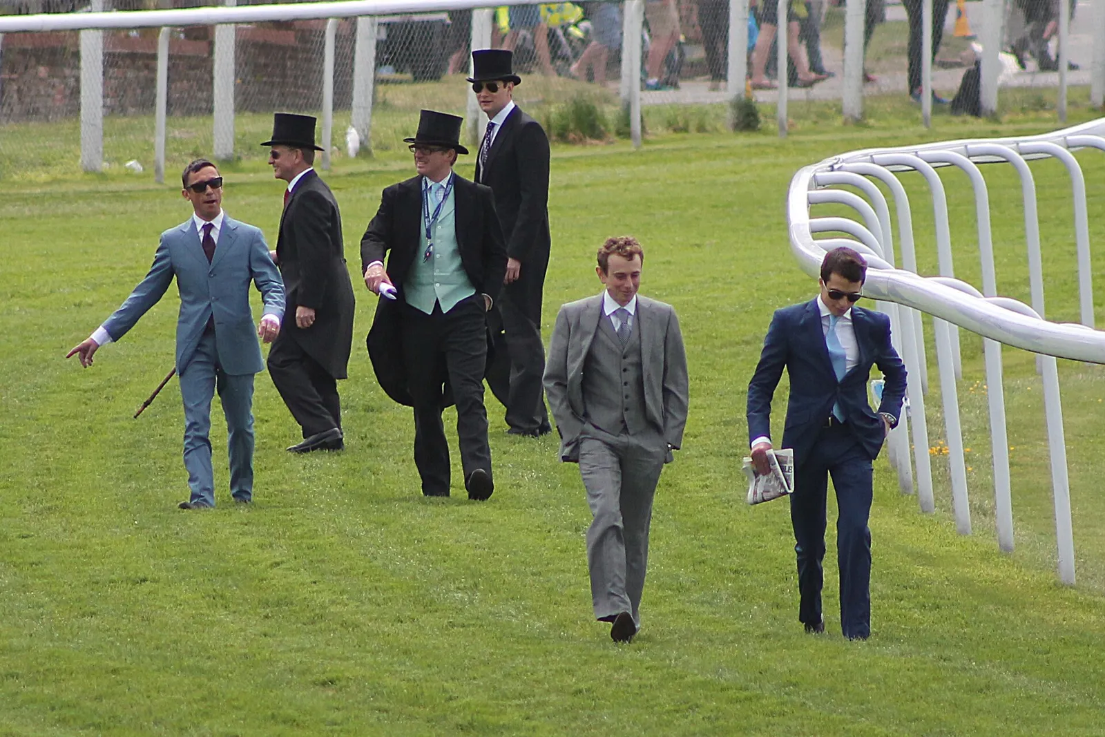 Frankie Dettori (left) with fellow jockeys walking the course at the 2015 Epsom Derby (file photograph)