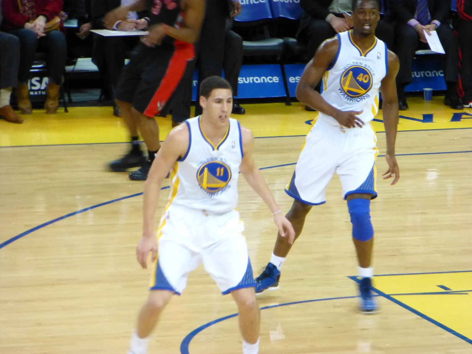 Klay Thompson, left, playing for the Golden State Warriors in 2013