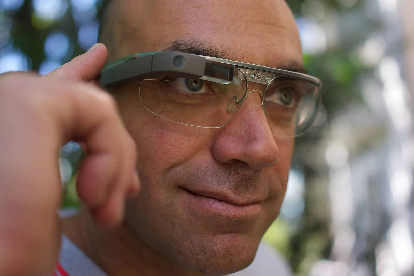 A person wearing smart glasses