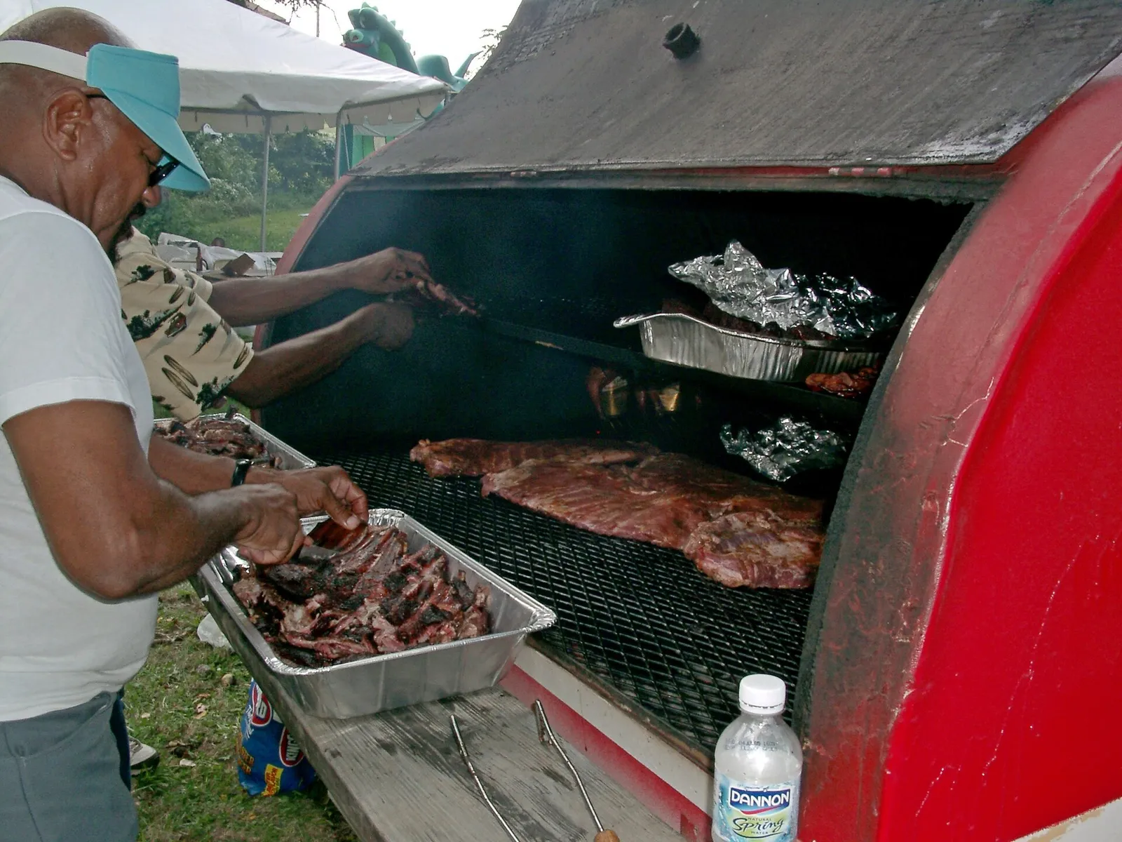 Meat grilling at a barbecue (file photograph)