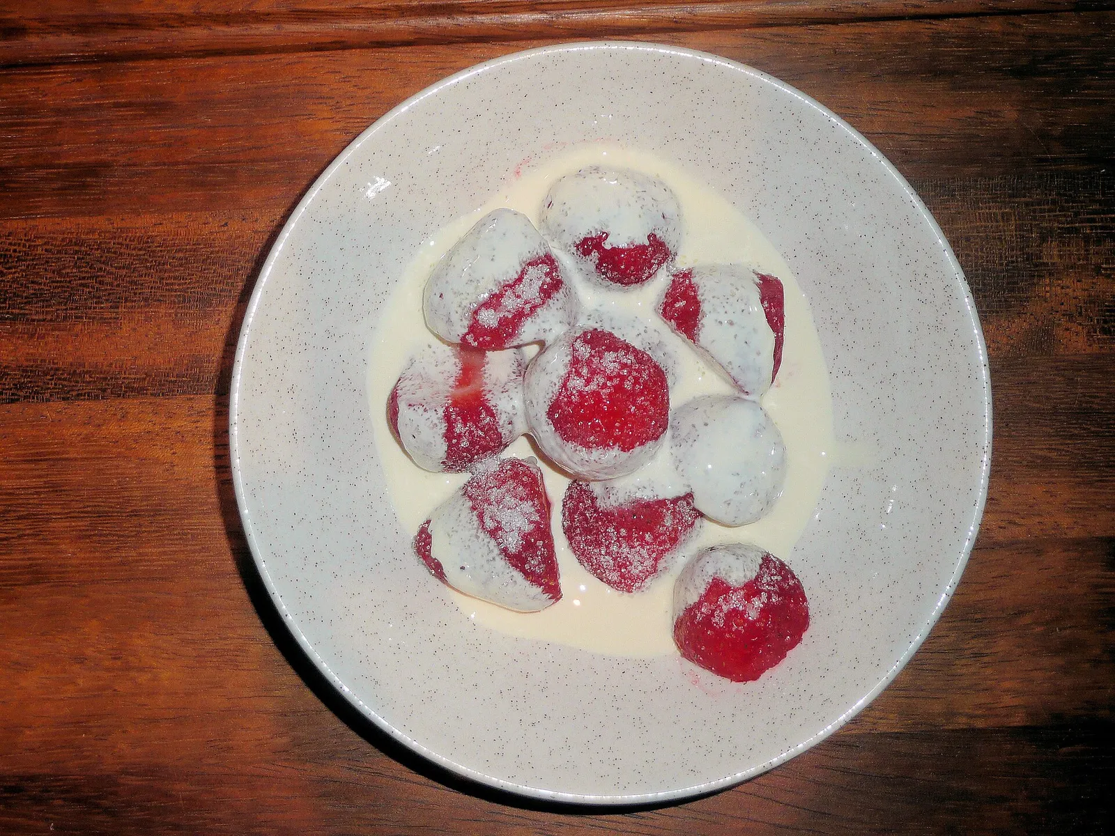 A bowl of strawberries and cream