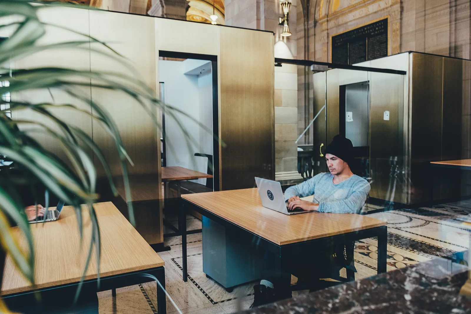 Desks in an open-plan office (illustrative photograph)
