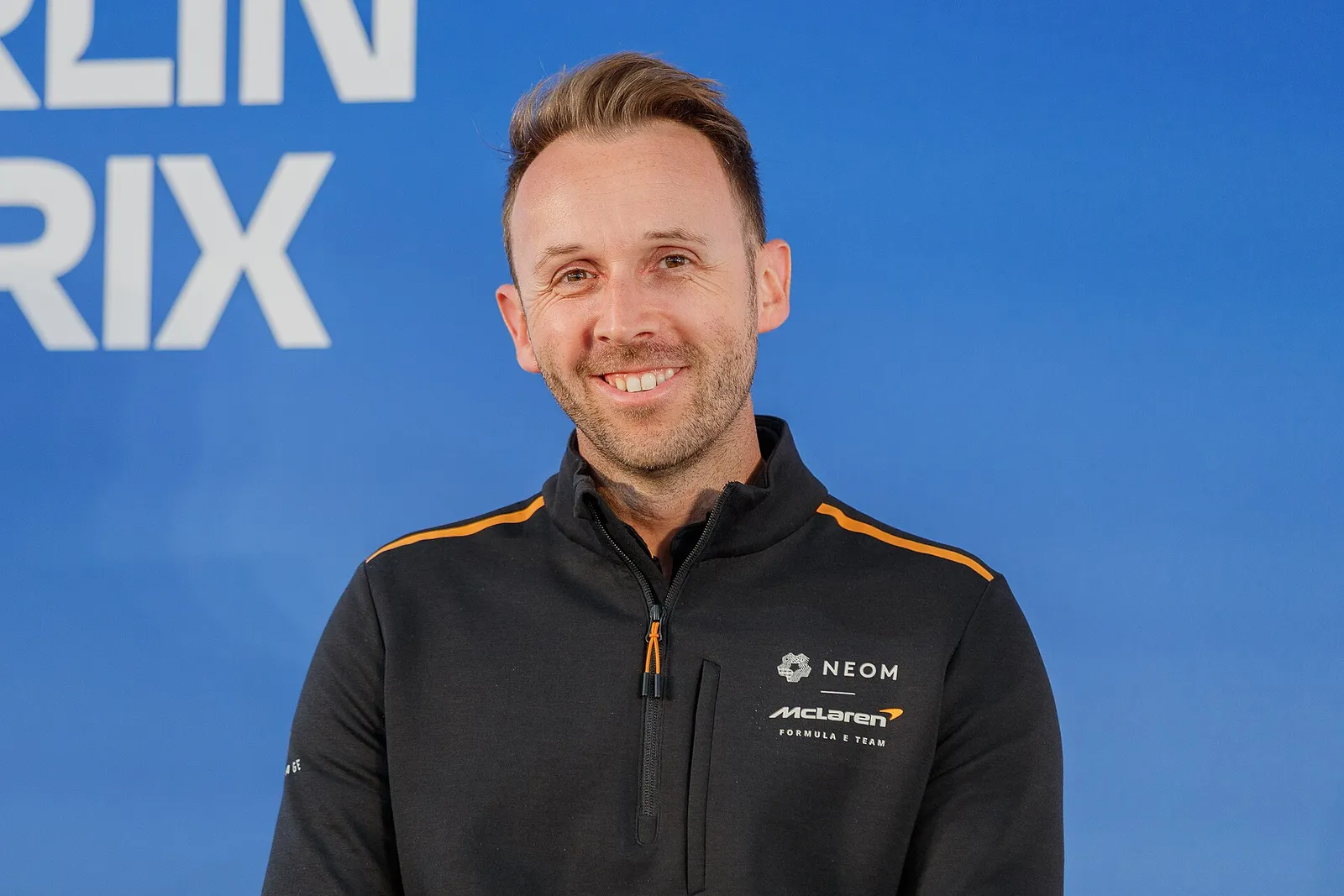 A Formula E car racing at the Berlin E-Prix