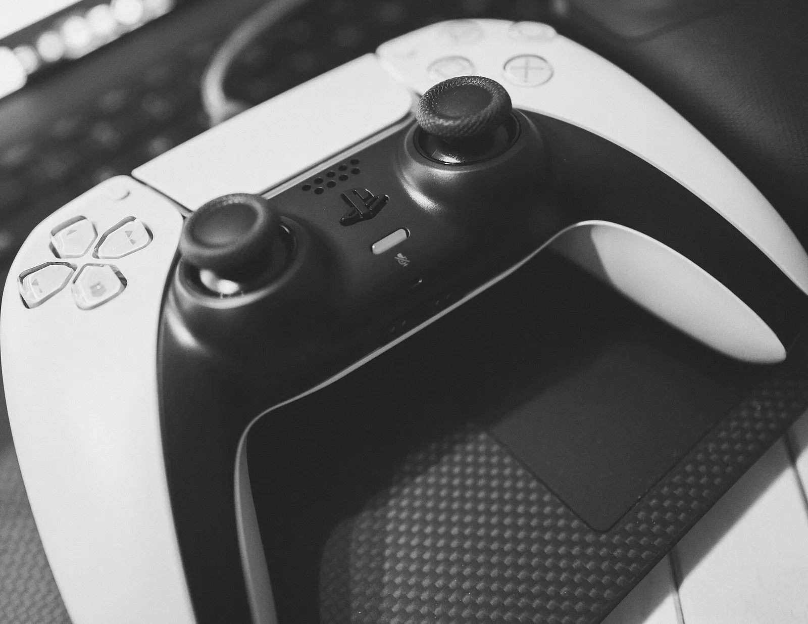 A PlayStation 5 DualSense controller, on the platform where GTA VI launches in November