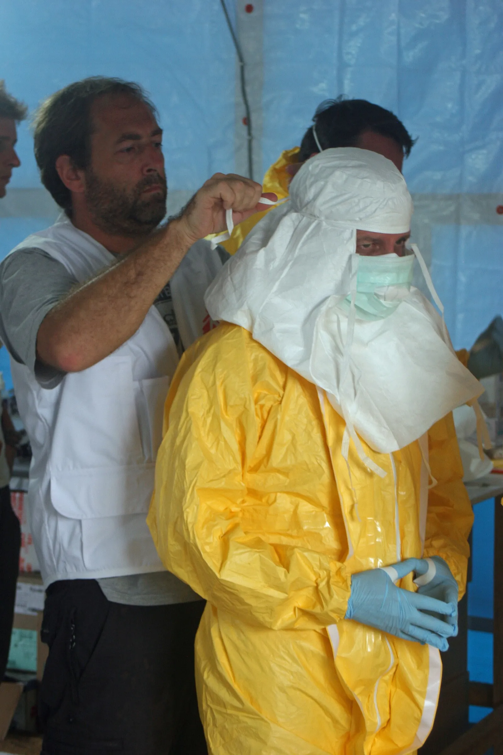 Health workers preparing to enter an Ebola treatment unit (file image)