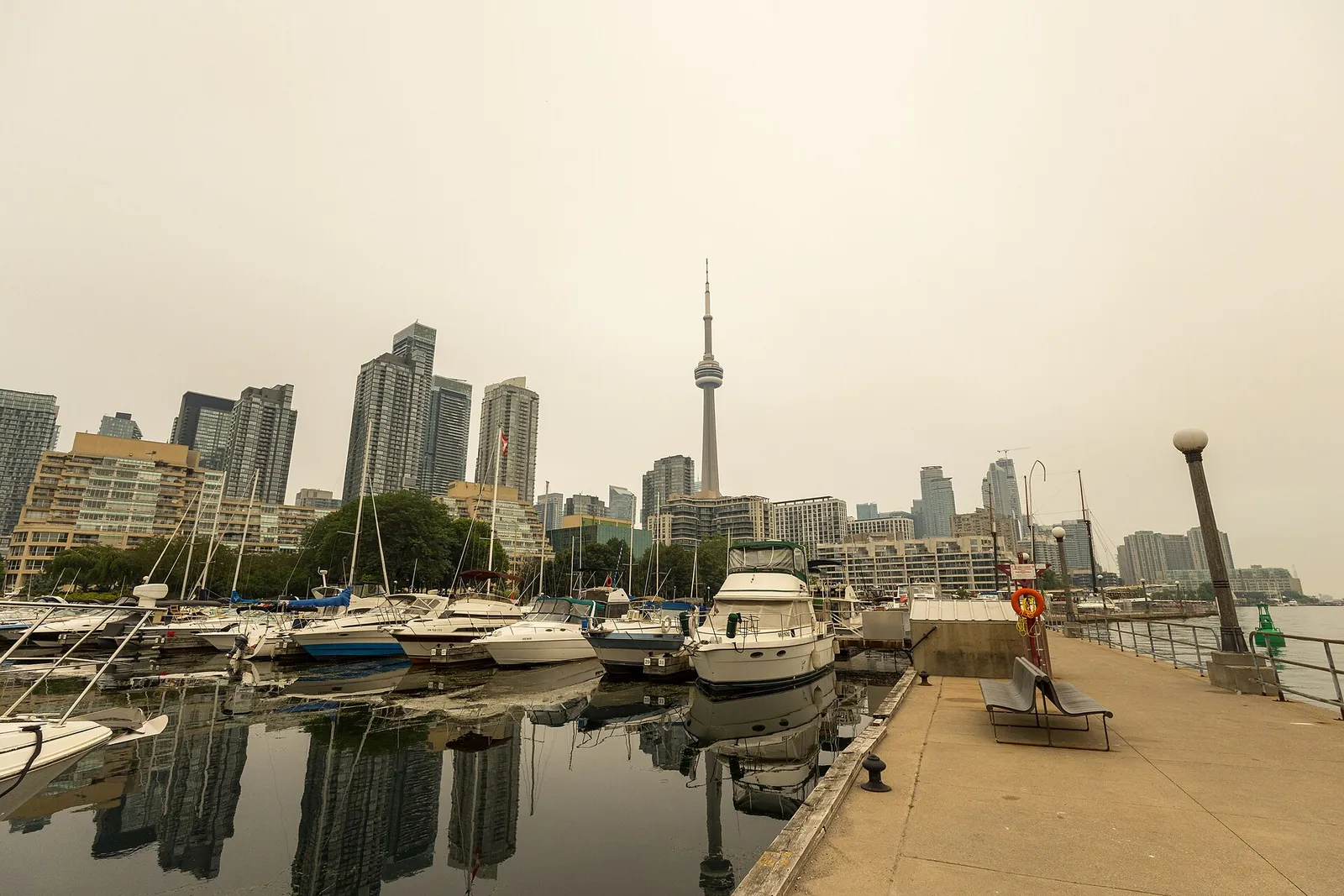 The Toronto skyline obscured by grey wildfire haze on July 15, 2026