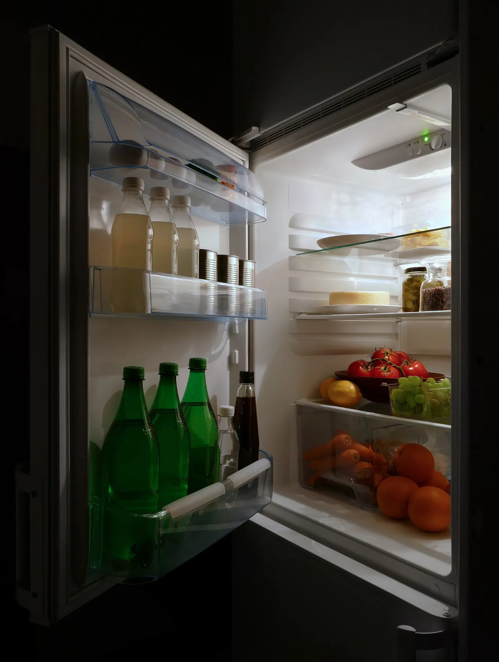 An open refrigerator stocked with food (file photograph)