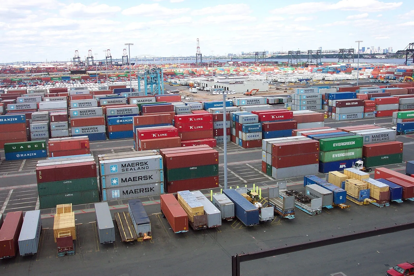 Shipping containers stacked at a port terminal