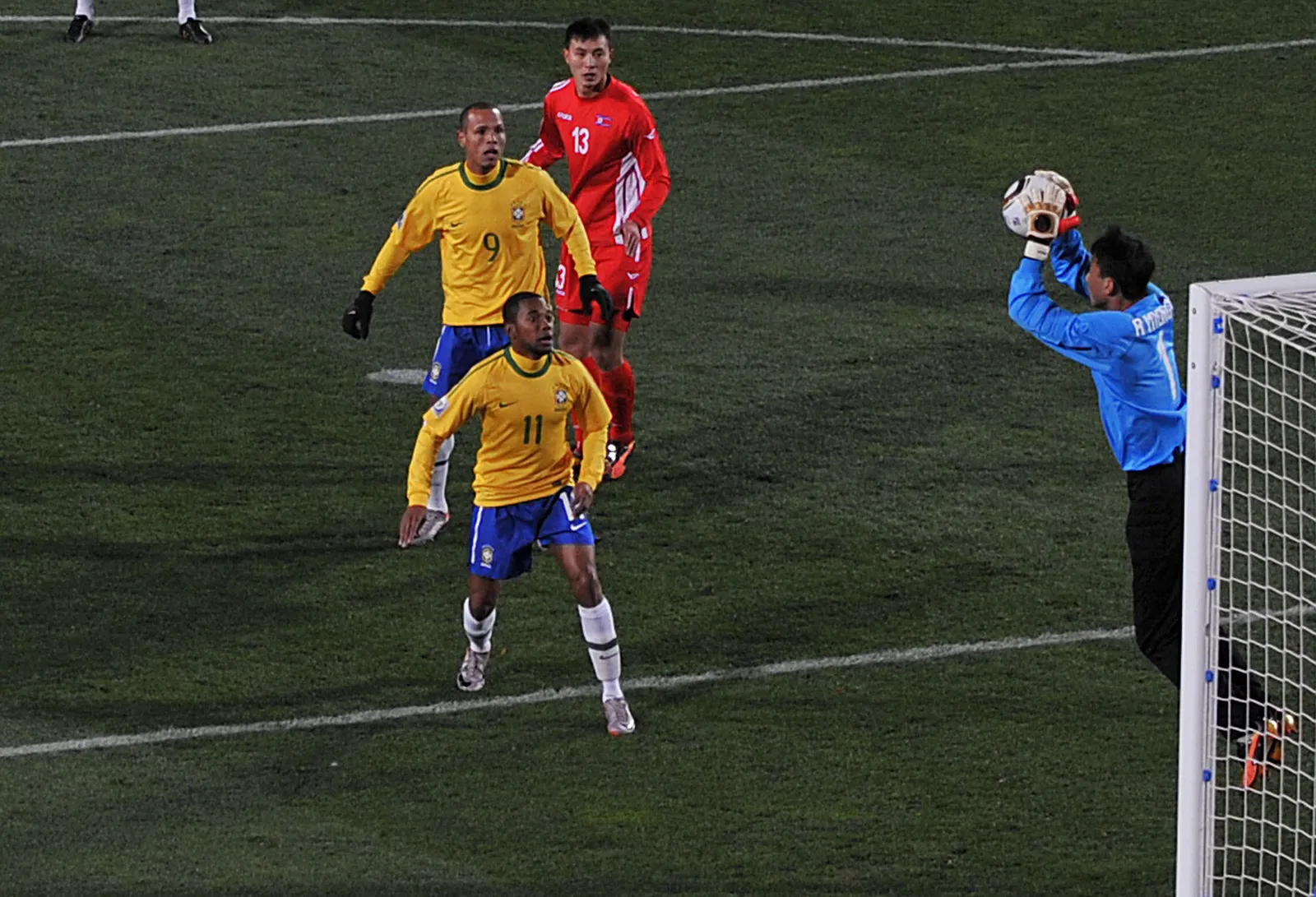 Brazil and North Korea players in contrasting kits at the 2010 World Cup