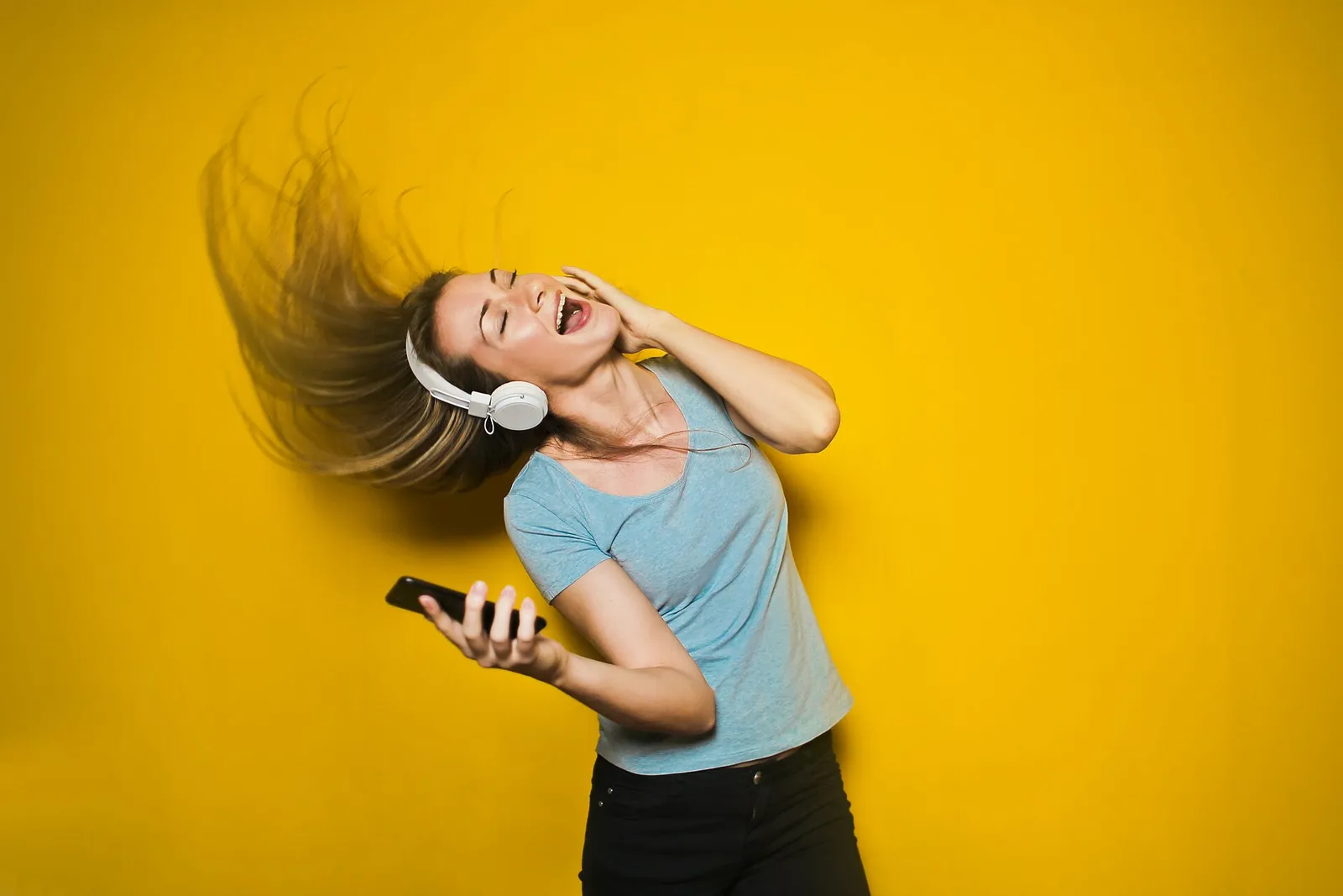 A person listening to music through headphones (file image)