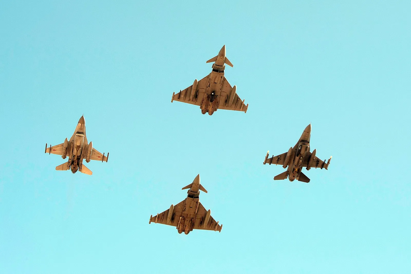 Romanian and allied F-16s in flight over Romania