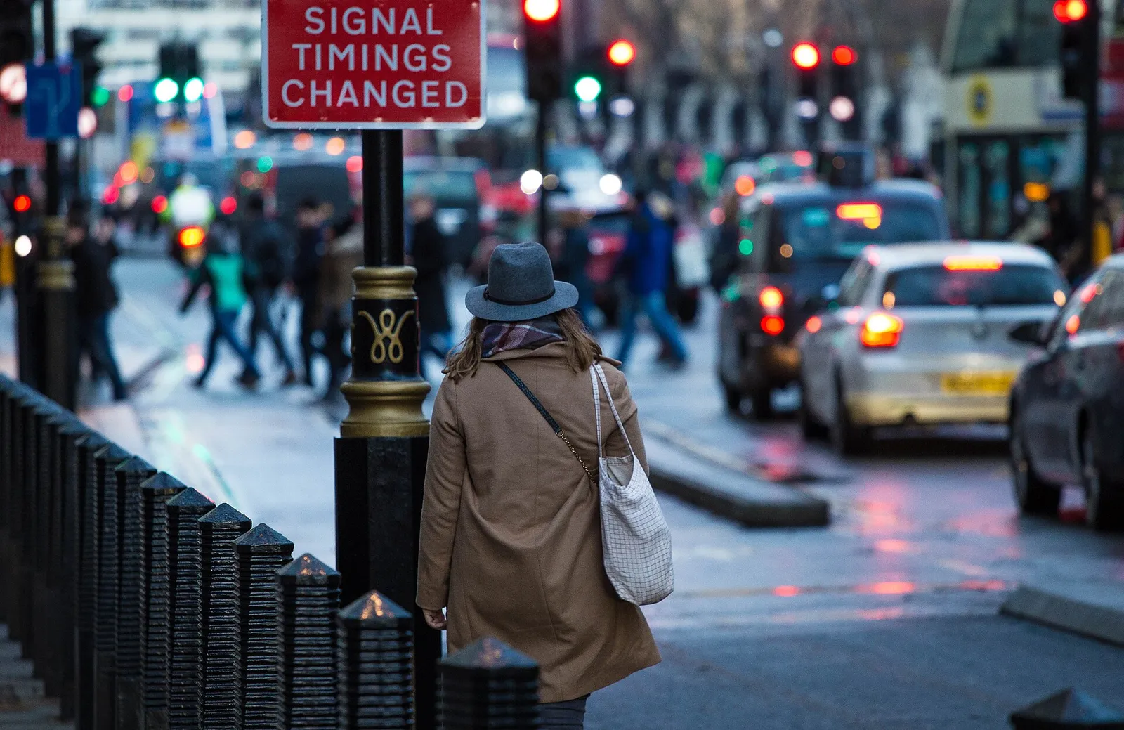 A woman walking along a city street
