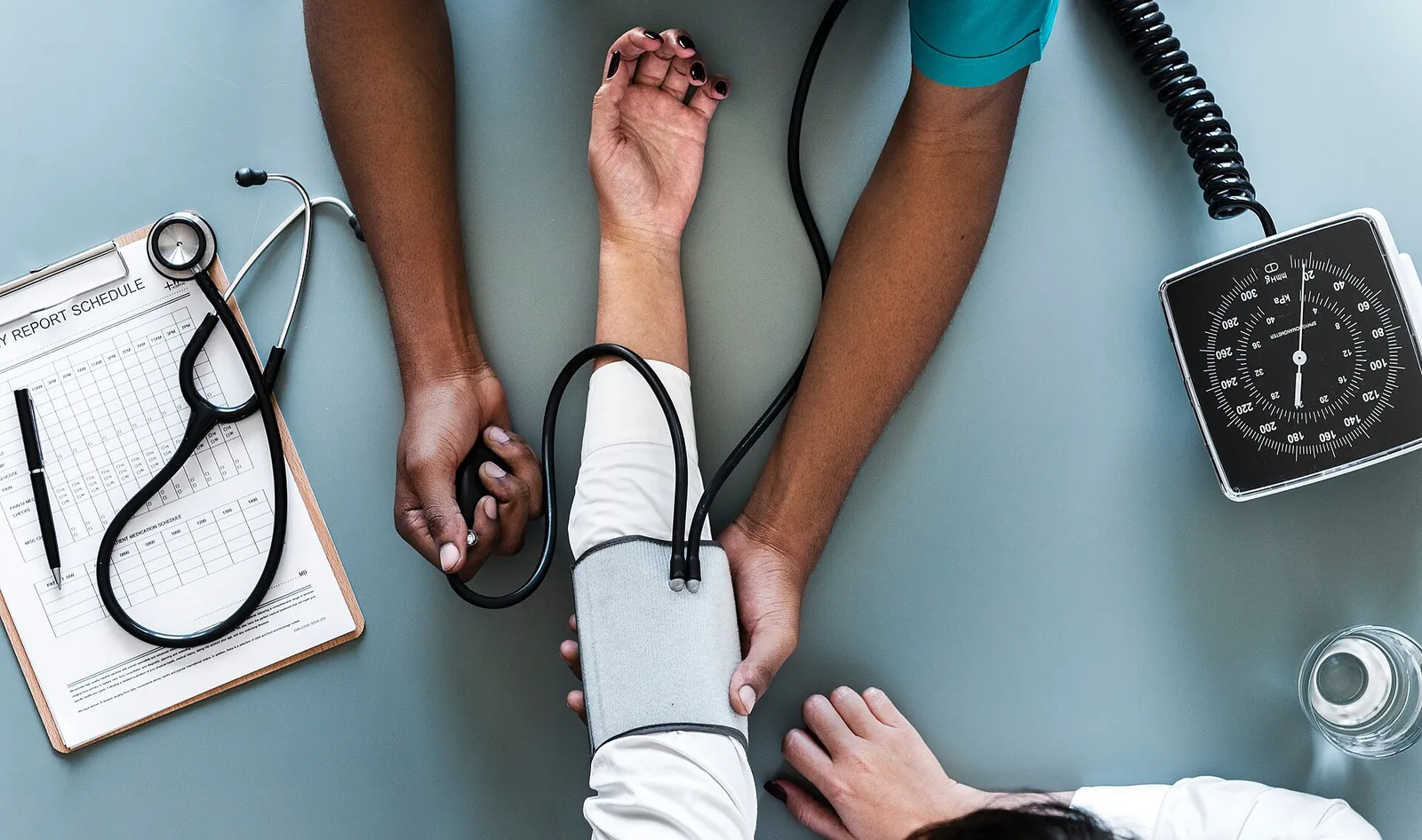 A person having their blood pressure measured